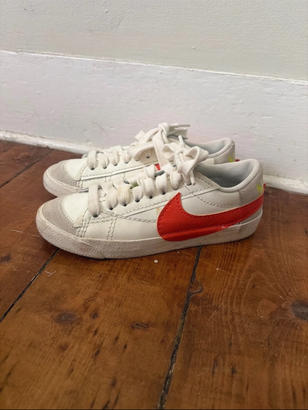 Nike women’s ' White Sneakers with Orange Swoosh